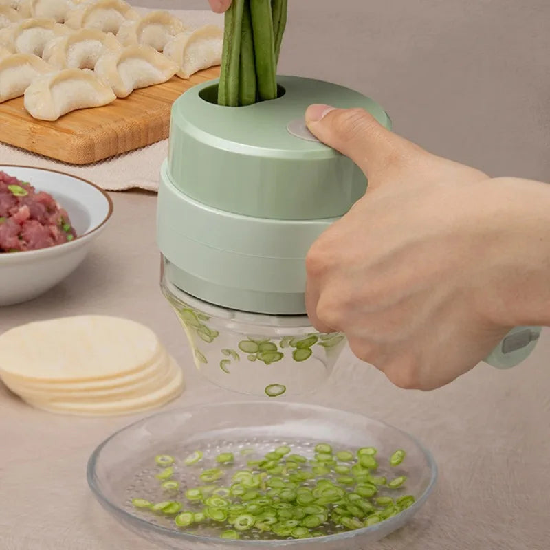 4-in-1 Electric Vegetable Cutter & Food Chopper – USB Rechargeable Kitchen Tool